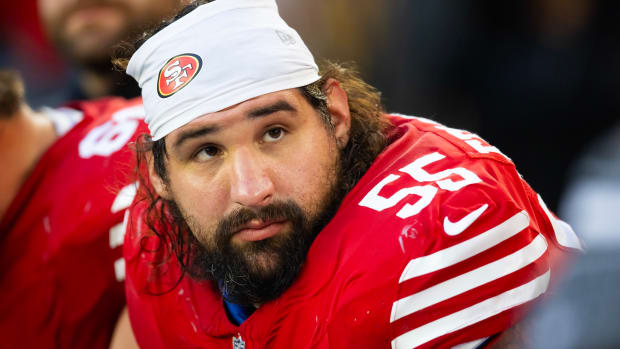 Dec 17, 2023; Glendale, Arizona, USA; San Francisco 49ers guard Jon Feliciano (55) against the Arizona Cardinals at State Farm Stadium. Mandatory Credit: Mark J. Rebilas-USA TODAY Sports  